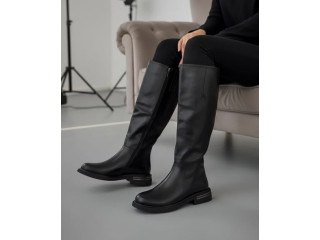 May be an image of boots