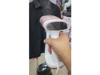 مكوى يدوي مع نظام شفط من ترست